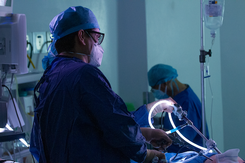 Dr Arellano Operating on Patient in Surgery Room