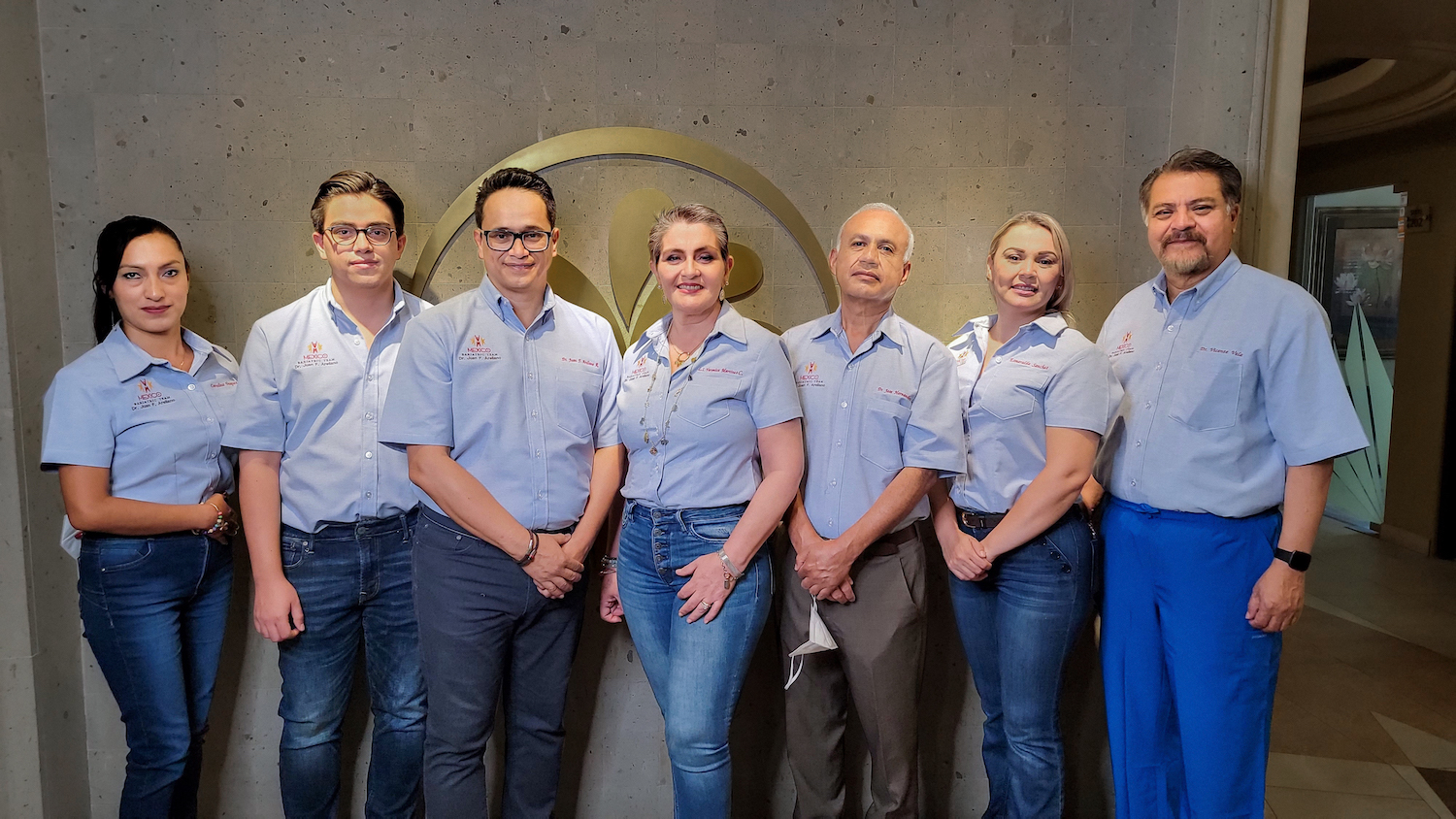 Dr. Juan Arrelano and Team together in front of bariatric office.