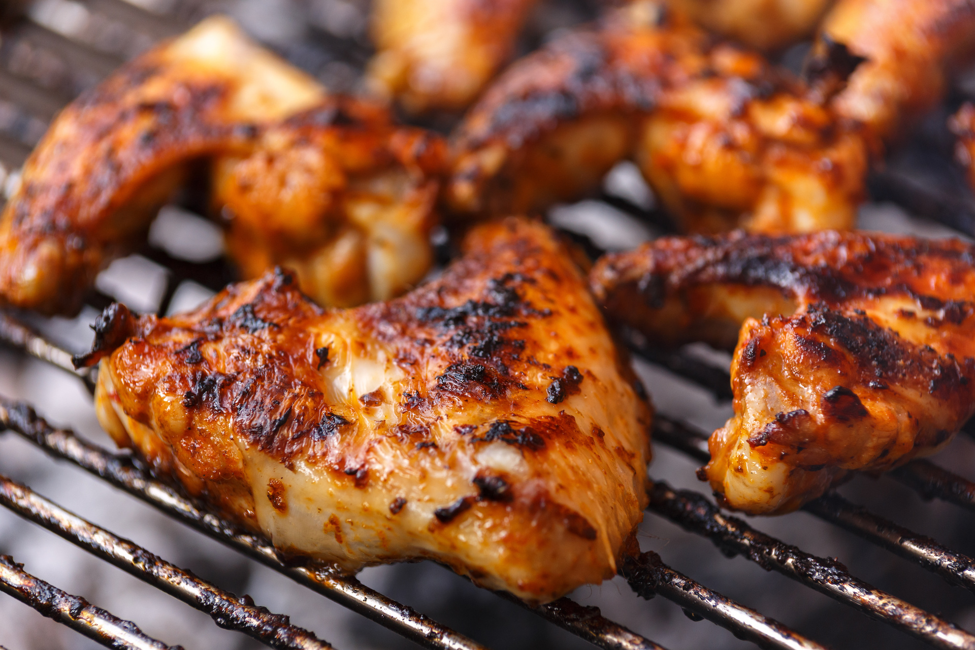 Harissa Chicken on the grill.