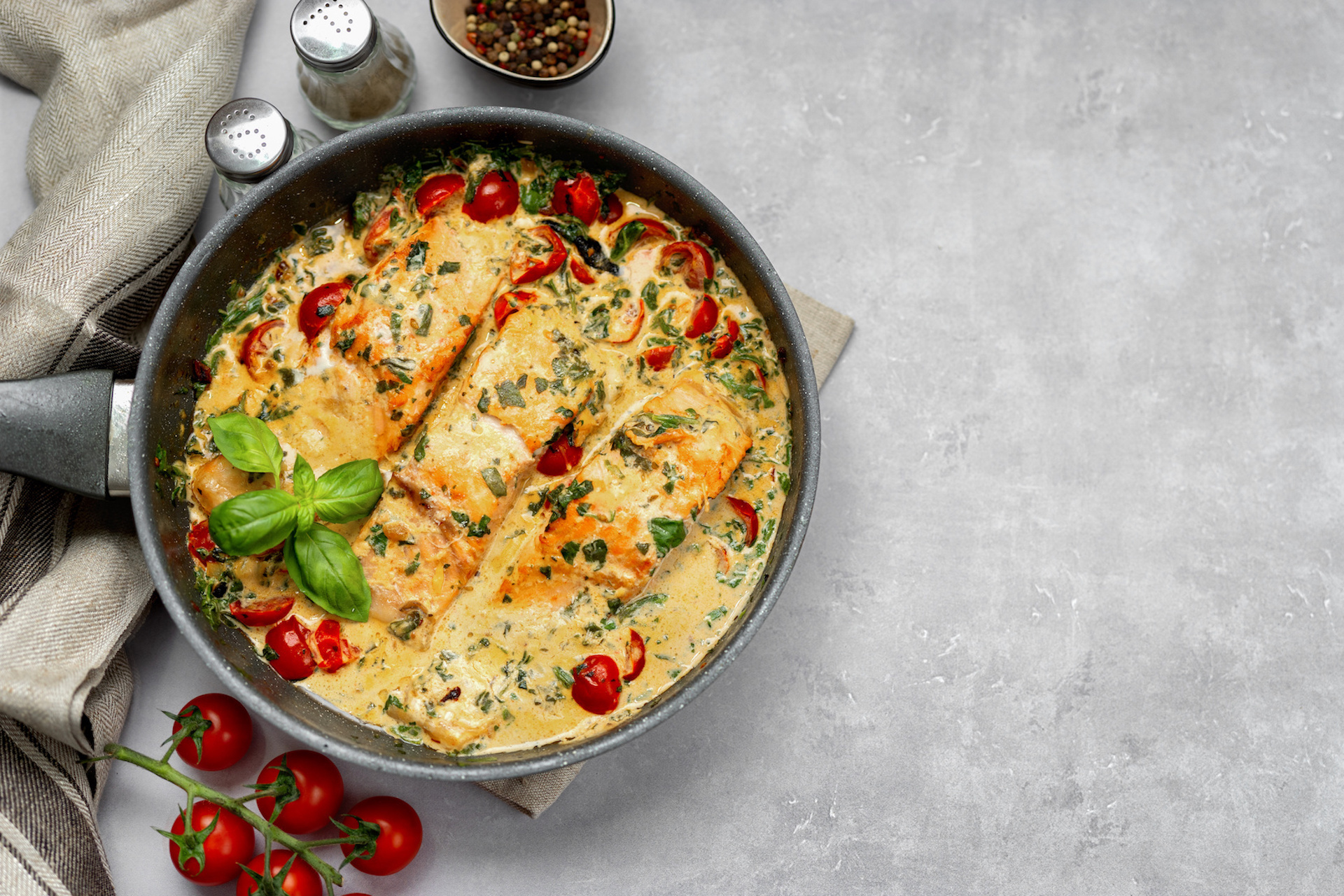 Heavenly Salmon with cherry tomatoes and parsley in 1 pot dish.